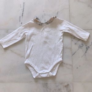 Burberry long sleeve onesie. Button closure.